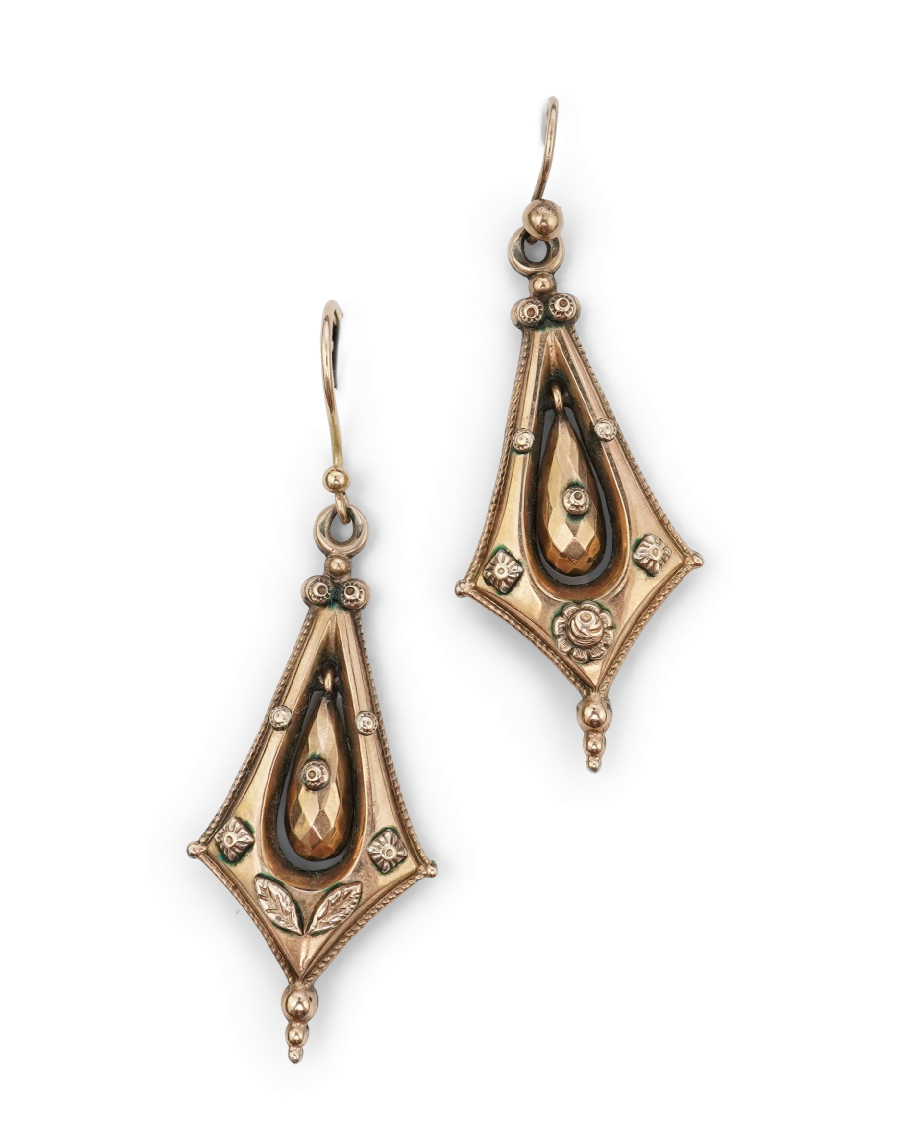 A pair of Victorian gold earrings, late 19th century, each of drop design, outlined with a rope twist border and accented with floral and foliate motifs, the centres suspending faceted pendants, length 5.8cm, one slightl
